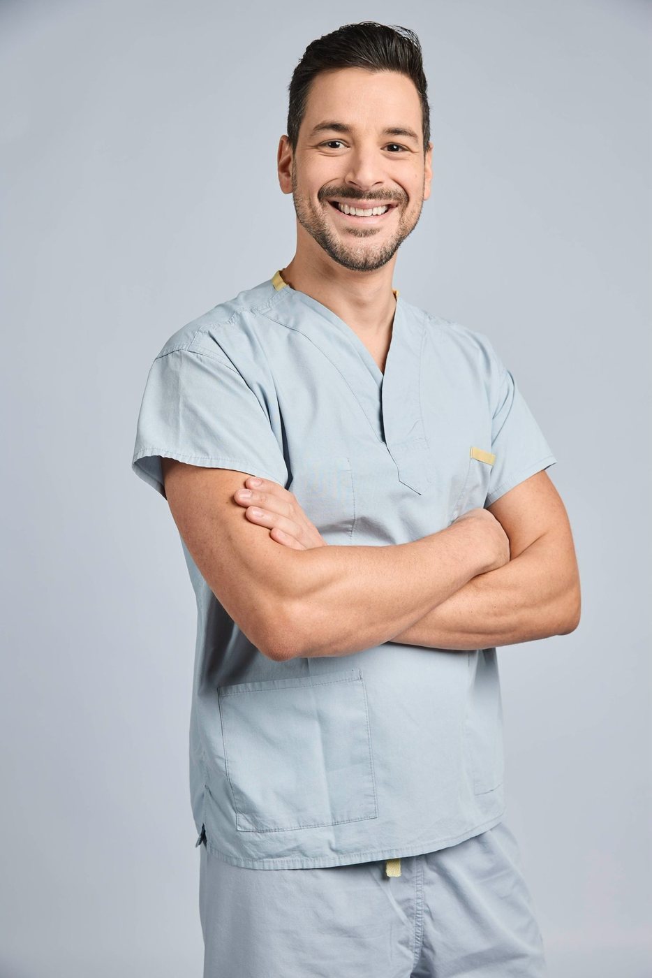 Dr. Filipe Santos, arms crossed